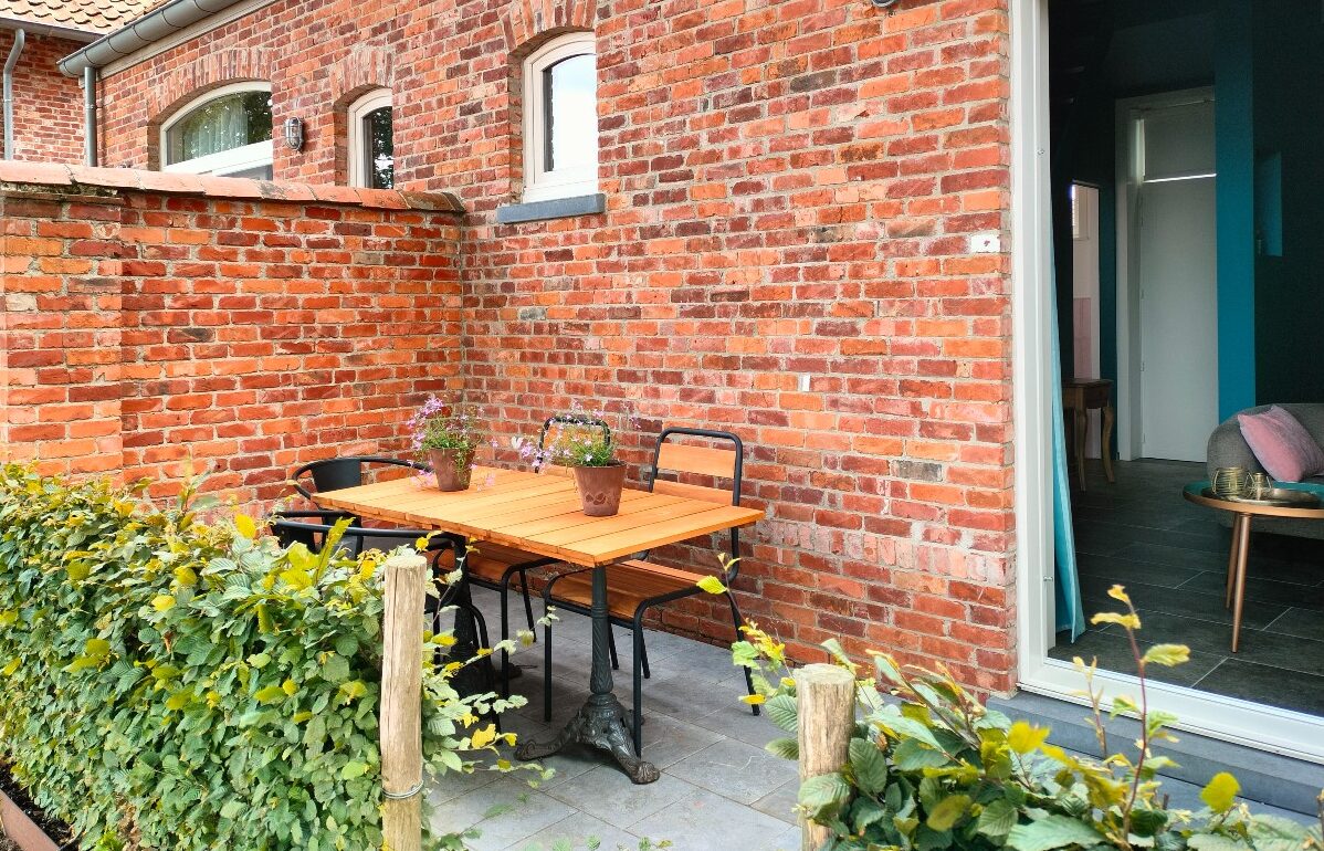B&B bij Brugge Foto van een terras bij de blauwe kamer